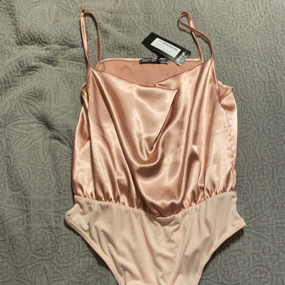 Pink body suit